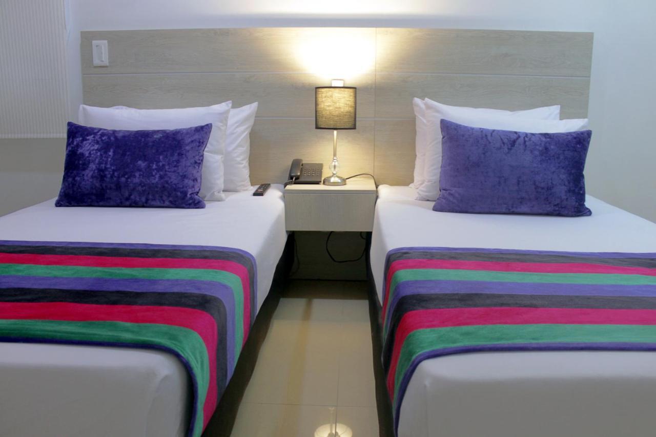 Hotel Suite Comfort Меделин Екстериор снимка